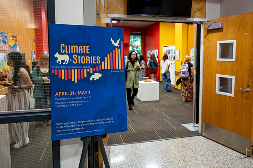 Students walkthrough the showcase gallery