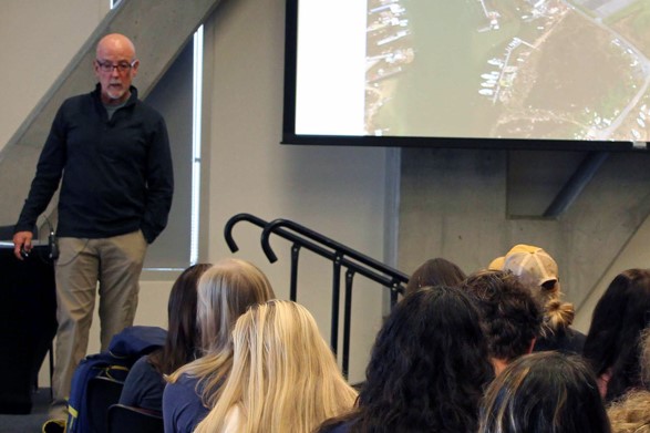 Climate lecturer in front of audience